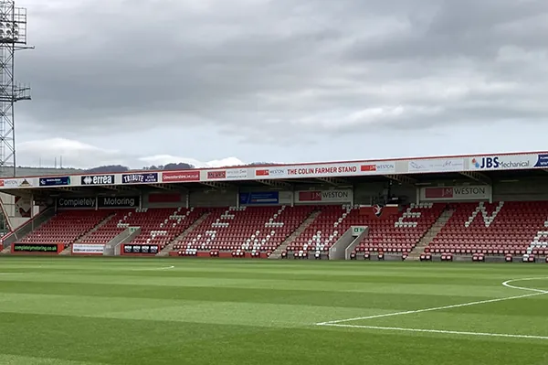Image of Cheltenham Town Football Club and their EV Chargers Football Stadium